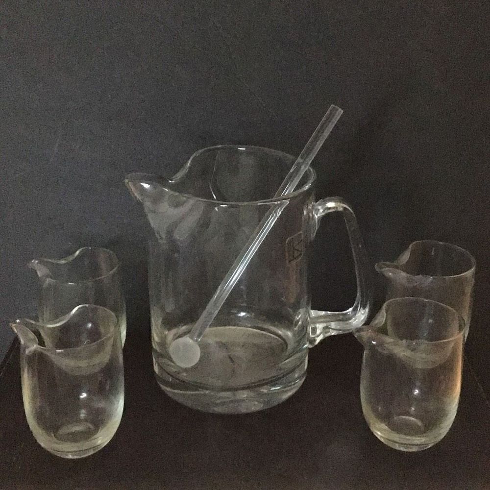 Pitcher and stirrer By Knobler with four matching glasses ￼